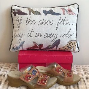 Gorgeous leather embroidered sandal.